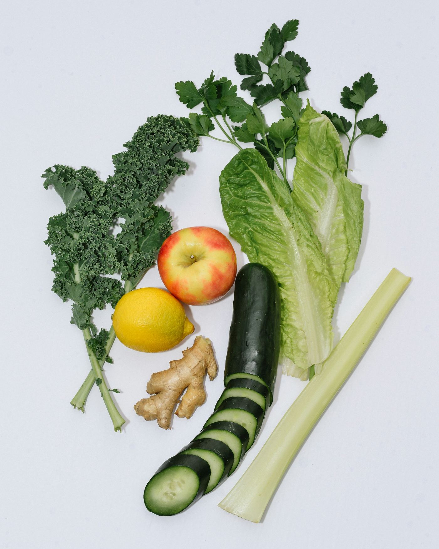 Fresh kale, lettuce, cucumber, celery, apple, lemon and ginger